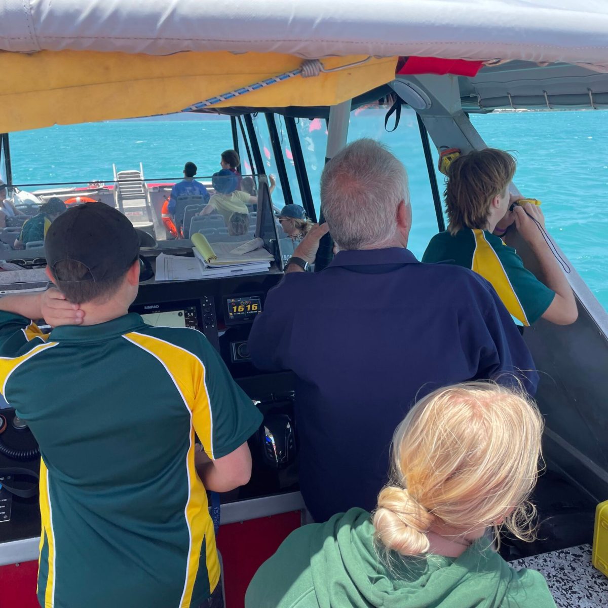 a group of people on a boat