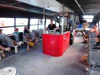 large open spaces inside the vessel with large oval central servery and seating either side