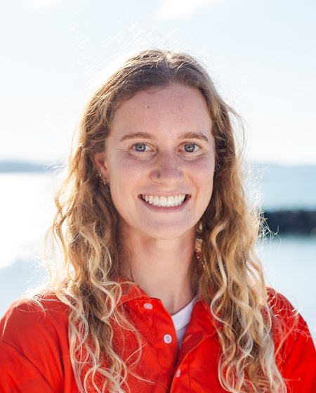 a woman smiling for the camera